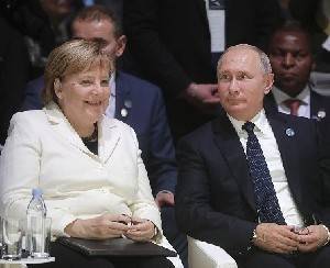 Меркель не отказалась от идеи саммита с Путиным - isra.com - Россия - Германия - Франция - Президент