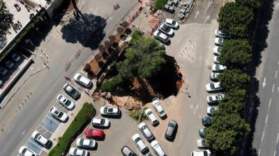 Три автомобиля провалились под землю в Иерусалиме - 5-tv.ru - Израиль - Иерусалим