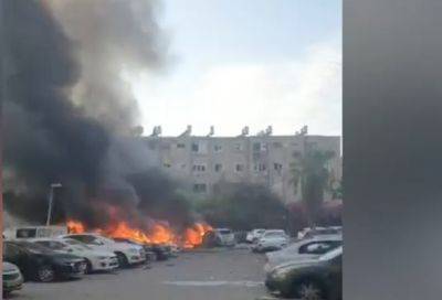 Видео: ракета упала на парковку в Ашдоде, горят несколько автомобилей, повреждены здания - nashe.orbita.co.il - Видео