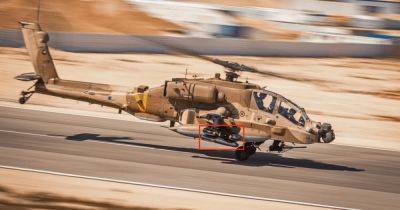 Израильский ударный вертолет AH-64 Apache заметили с таинственной ракетой Hellfire (фото) - focus.ua - Израиль - Украина