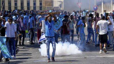 Тель-Авив: десятки людей пострадали в результате протестов эритрейцев - ru.euronews.com - Израиль - Тель-Авив - Эритрея