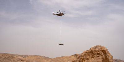 Видео: упавшую рядом с Арадом иранскую ракету увезли с помощью вертолета - detaly.co.il - Израиль - Тегеран