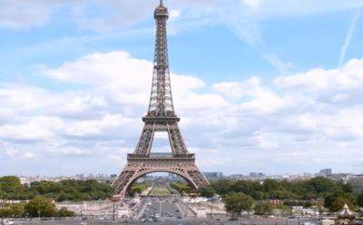 Олимпийские кольца установлены на Эйфелевой башне, за 50 дней до начала Игр - mignews.net - Париж - Дней